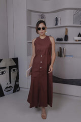 Side view of brown khadi midi dress with flared hem and clean silhouette