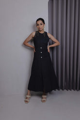 Sleeveless black khadi cotton midi dress with round neck and princess panels