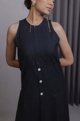 Close-up of wooden buttons on khadi cotton black midi dress