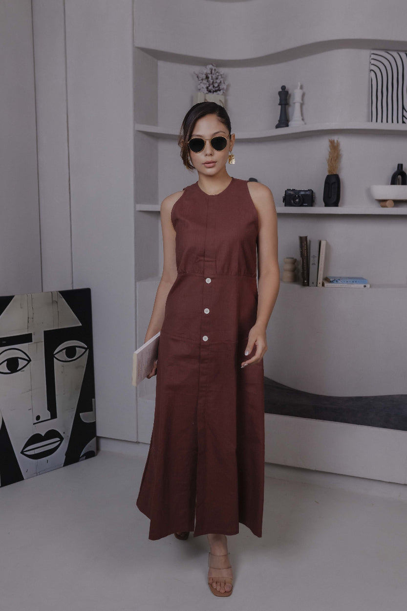Side view of brown khadi midi dress with flared hem and clean silhouette


